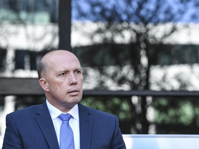 Australian Home Affairs Minister Peter Dutton attends the swearing-in ceremony of newly appointed Australian Border Force Commissioner Michal Outram at the headquarter of the Australian Border Force in Canberra, Monday, May 14, 2018. (AAP Image/Lukas Coch) NO ARCHIVING