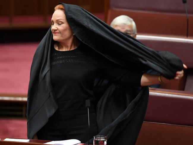 The calls follows One Nation Senator Pauline Hanson’s burqa stunt in during Senate Question Time at Parliament House. Picture: Lukas Coch/AAP