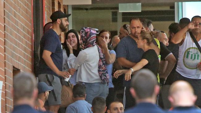 Connections of Rockdale bikie shooting victim Mick Hawi gather at St George hospital.