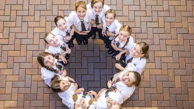 (Clockwise from top) Abigail and Zoe Cooper, Hannah and Paige Mines, Amelia and Mikaela Puxty, Poppy and Meg Muirhead, Sophia and Rose Scarcella, and Ingrid and Louise Tanwan. Picture: AAP/Richard Walker