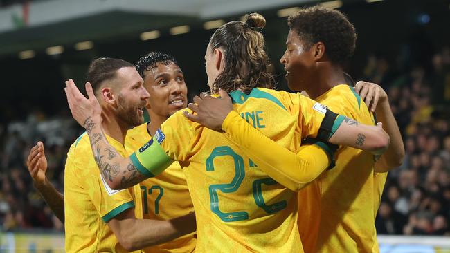 The Socceroos celebrate after a Kusini Yengi goal in Perth. Picture: Will Russell/Getty Images