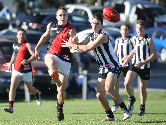 Michael Zaluski (Morphett Vale) kicks the ball during the first quarter. Reynella v Morphett Vale, at Reynella Oval. Southern Football League. 21/05/17  Picture: Stephen Laffer