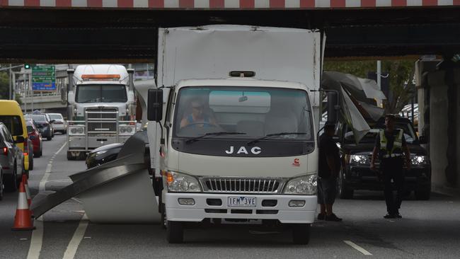 A truck wedged under the light-rail bridge on Montague St. Picture: Jay Town