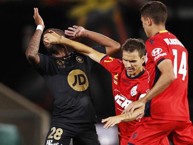 ADELAIDE, AUSTRALIA - FEBRUARY 16: IsaÃ­as SÃ¡nchez of Adelaide (C) United and Roly Bonevacia of the Wanderers collide during the round 19 A-League match between Adelaide United and the Western Sydney Wanderers at Coopers Stadium on February 16, 2019 in Adelaide, Australia. (Photo by Daniel Pockett/Getty Images)