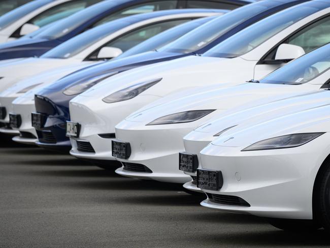 LONDON, ENGLAND - APRIL 15: Rows of new Tesla cars are seen in a holding area near a customer collection point on April 15, 2024 in London, England. According to a memo sent to staff today, the company will reduce its global workforce by 10%. As of last December, it had just over 140,000 employees according to its last annual report. (Photo by Leon Neal/Getty Images)