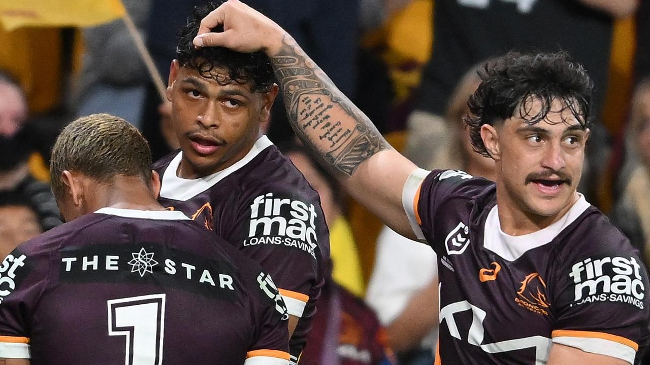 BRISBANE, AUSTRALIA - AUGUST 23: Selwyn Cobbo of the Broncos celebrates scoring a try with team mates during the round 25 NRL match between Brisbane Broncos and Parramatta Eels at Suncorp Stadium, on August 23, 2024, in Brisbane, Australia. (Photo by Matt Roberts/Getty Images)