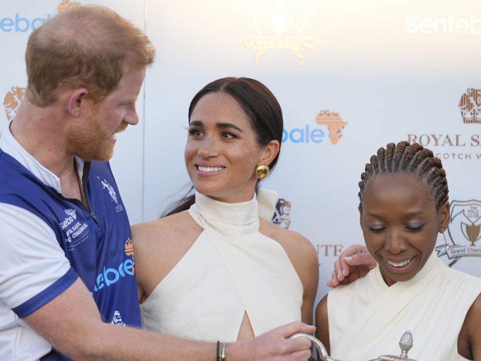 WATCH: Meghan Markle’s awkward on stage moment with Prince Harry