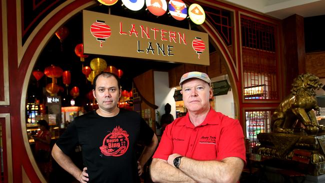 Business owners James Sing from House of Bing and Brad Green from Aroy Jung who have had major issues with phone and internet service at their new business in the Lantern Lane Asian food court in Stockland Shopping Centre. PICTURE: STEWART MCLEAN