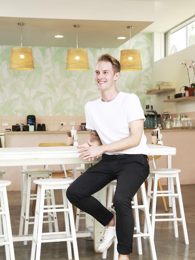 Joedy Kyle poses at his new cafe space on Sydney Street, New Farm. (AAP Image/Claudia Baxter)