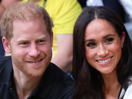 DUESSELDORF, GERMANY - SEPTEMBER 13: Prince Harry, Duke of Sussex and Meghan, Duchess of Sussex pose for a photograph as they attend the Wheelchair Basketball preliminary match between Ukraine and Australia during day four of the Invictus Games Düsseldorf 2023 on September 13, 2023 in Duesseldorf, Germany. (Photo by Chris Jackson/Getty Images for the Invictus Games Foundation)