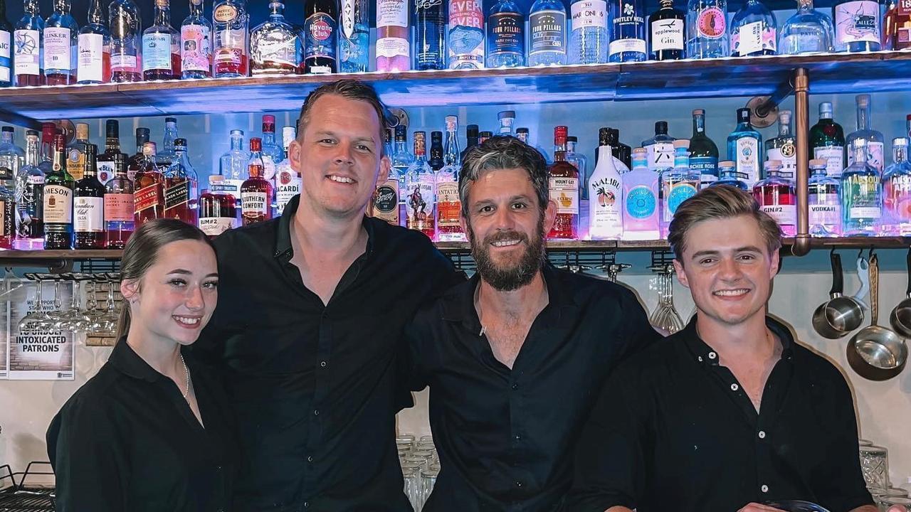 Owners Kieran and Rick Deal (middle) with 19XO bartenders, Shylar Davis and Adam Cramer.