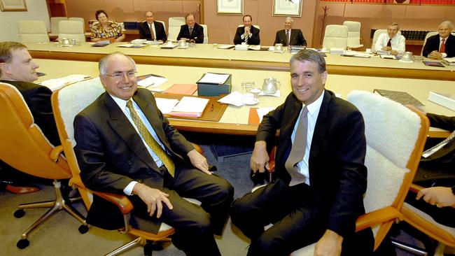 Then Treasurer Peter Costello, left, prime minister John Howard and deputy prime minister John Anderson in a Cabinet meeting in April 2001.