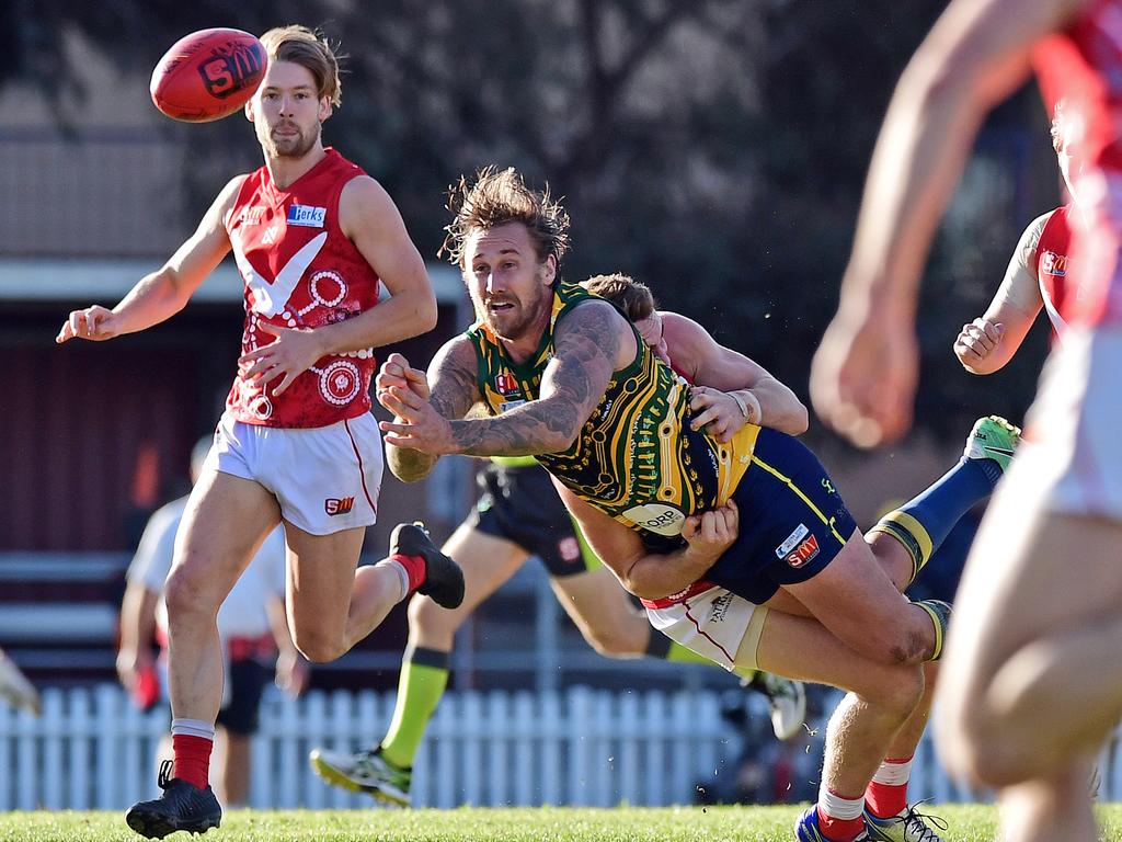 14/07/18 - SANFL: North Adelaide v Eagles at Prospect Oval.  Eagle Scott Lewis gets a handpass away.Picture: Tom Huntley