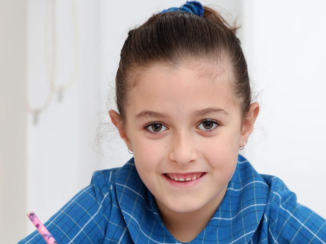 Year 3 student Tiana Massey, 8, at home in Earlwood for a story about how parents want to get their kids into opportunity classes. Picture: Jonathan Ng