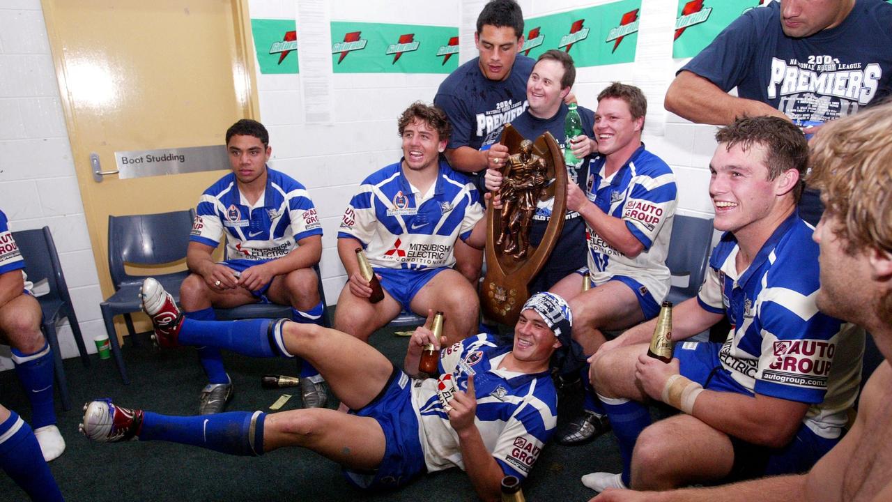 Willie Tonga, Adam Perry, Sonny Bill Williams, Corey Hughes and Ben Harris celebrate in the sheds.