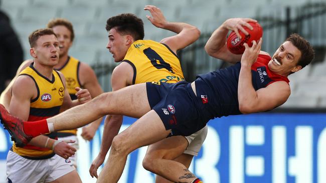 Jake Lever takes a spectacular grab. Picture: Michael Klein