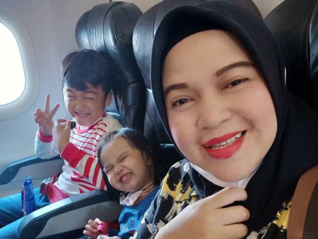 Flight 182 passenger Rathi Windania and her children on board the plane before it crashed. Picture: Instagram