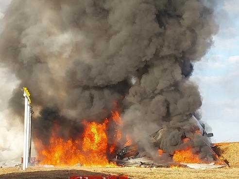 MUAN-GUN, SOUTH KOREA - DECEMBER 29: (EDITORÃ¢â¬â¢S NOTE: This Handout image was provided by a third-party organization and may not adhere to Getty ImagesÃ¢â¬â¢ editorial policy.) In this handout photo provided by the South Korean National Fire Agency, Jeju Air Flight 7C2216 burns after skidding off the runway at Muan International Airport on December 29, 2024 in Muan-gun, South Korea. According to reports, Jeju Air Flight 7C2216 was carrying 175 passengers and six crew members when it attempted to land without landing gear. The Boeing 737 overran the runway and exploded after colliding with a wall. According to South Korean authorities, there are at least 64 fatalities and two survivors rescued from the crash with the casualty count is expected to rise. (Photo by South Korean National Fire Agency via Getty Images)