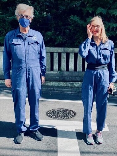 Wenders and his wife Donata wearing Tokyo Toilets uniforms, featured in Perfect Days