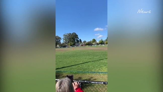 Helicopter used to dry out footy ground