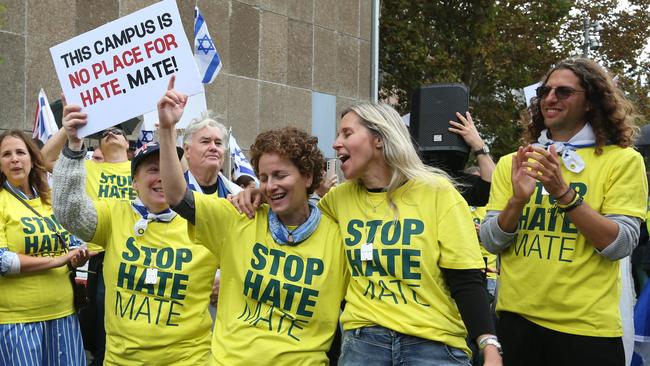 Many pro-Israel counter-protesters wore yellow shirts that read “stop hate, mate”. Picture: Britta Campion/The Australian