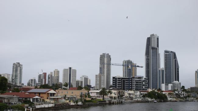 Storm clouds gather around the highrises of Surfers Paradise as the economy struggles. Picture Glenn Hampson