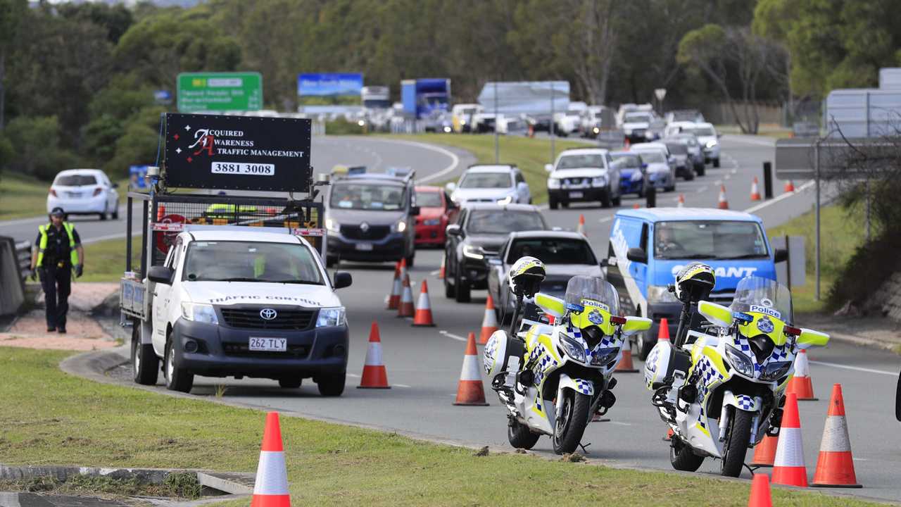 Queensland Police set up a road block due to the Corona Virus at the NSW / Queensland Border on the old Pacific Highway at Coolangatta. Photo: Scott Powick Newscorp