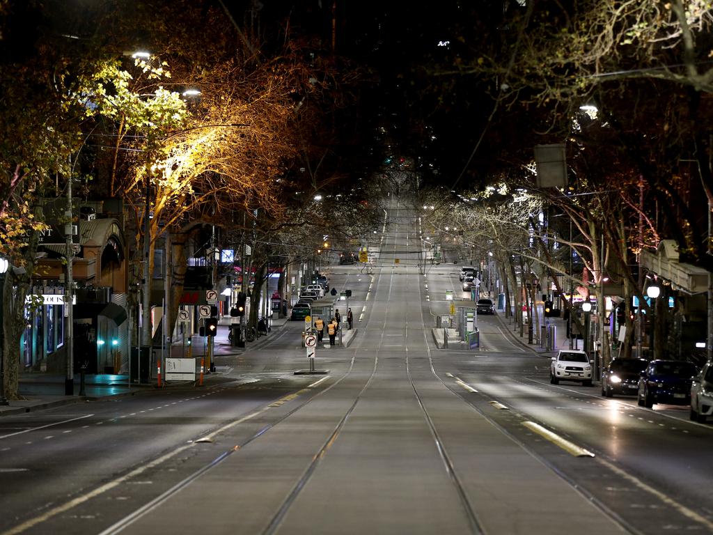 A permit system will be brought in for people still working. A general view of Collins Street after 8pm as the city’s curfew was introduced. Picture: Darrian Traynor/Getty Images