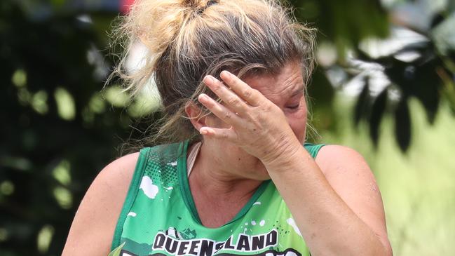 A mourner at the scene of the stabbing that took Angus Beaumont’s life. Picture: Annette Dew