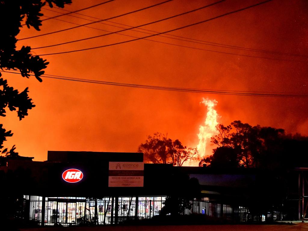 Fierce winds fuelled the flames as they destroyed property and threatened more. Picture: John McCutcheon/Sunshine Coast Daily