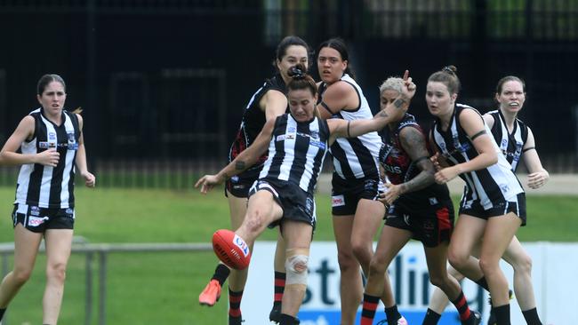 Natasha Medbury clears the ball in round 1 of the NTFL 22/23 season. Picture: (A)manda Parkinson