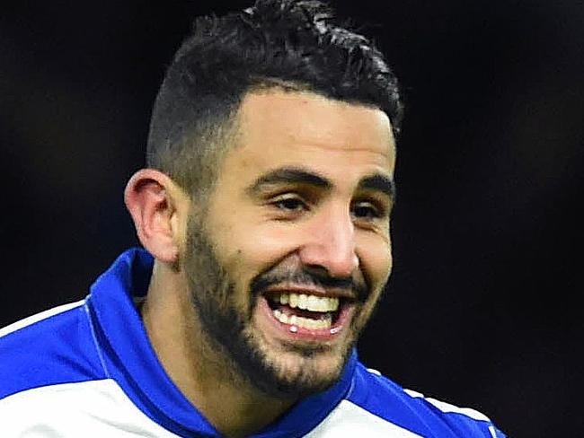 CORRECTION - Leicester City's Algerian midfielder Riyad Mahrez (R) celebrates scoring his team's first goal with Leicester City's English midfielder Danny Drinkwater and Leicester City's English defender Danny Simpson (C) during the English Premier League football match between Watford and Leicester City at Vicarage Road Stadium in Watford, north of London on March 5, 2016. / AFP / OLLY GREENWOOD / RESTRICTED TO EDITORIAL USE. No use with unauthorized audio, video, data, fixture lists, club/league logos or 'live' services. Online in-match use limited to 75 images, no video emulation. No use in betting, games or single club/league/player publications. / CORRECTION - Correcting identity “The erroneous mention[s] appearing in the metadata of this photo by OLLY GREENWOOD has been modified in AFP systems in the following manner: [Leicester City's Algerian midfielder Riyad Mahrez (R) celebrates scoring his team's first goal with Leicester City's English midfielder Danny Drinkwater and Leicester City's English defender Danny Simpson (C) during the English Premier League football match between Watford and Leicester City at Vicarage Road Stadium in Watford, north of London on March 5, 2016.] instead of [Leicester City's Algerian midfielder Riyad Mahrez (R) celebrates scoring his team's first goal with Leicester City's English midfielder Danny Drinkwater and Leicester City's Ghanaian midfielder Daniel Amartey (C) during the English Premier League football match between Watford and Leicester City at Vicarage Road Stadium in Watford, north of London on March 5, 2016.]. Please immediately remove the erroneous mention[s] from all your online services and delete it (them) from your servers. If you have been authorized by AFP to distribute it (them) to third parties, please ensure that the same actions are carried out by them. Failure to promptly comply with these instructions will entail liability on your part for any continued or post notification usage. Therefore we thank you