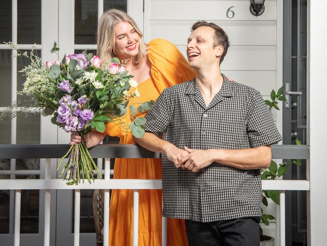 Ava Dunstan gives her partner Daniel Seymour a bunch to say thanks for being a great bloke. Picture: Brad Fleet