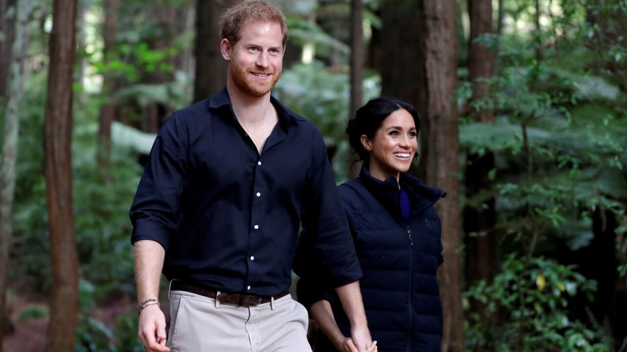 Prince Harry ‘so often’ holds Meghan Markle’s hand ‘like a security blanket’