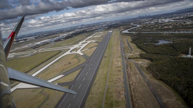 Brisbane's new Runway photographed from the air on an Australian made wartime plane at an event to celebrate the runway's opening. Picture: Glenn Hunt/Getty Images