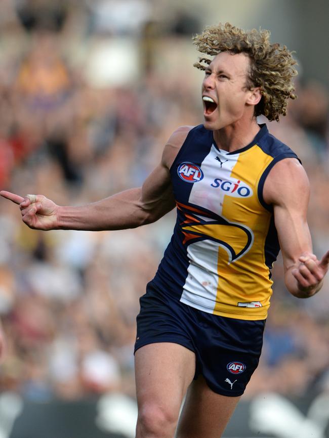 Matt Priddis celebrates a goal against Collingwood. Picture: Daniel Wilkins