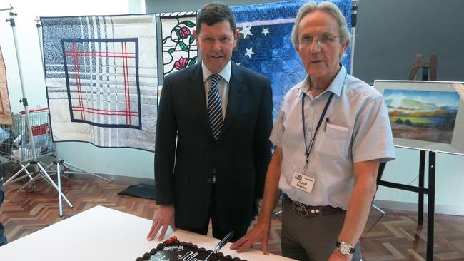 Menzies Liberal MP Kevin Andrews and Manningham U3A president Geoff Sheldon celebrate the organisation's 25th anniversary.