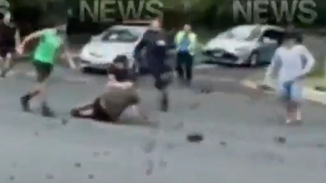 The moment the man was tackled to the ground. Picture: Nine News