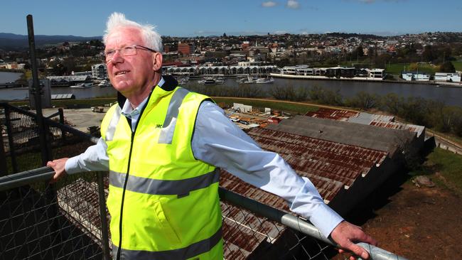 JMC Group Managing Director Errol Stewart on top of the Silos at Launceston with the Launceston Seaport in the background