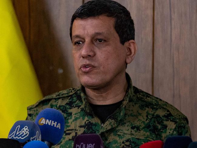 Syrian Democratic Forces (SDF) commander-in-chief Mazloum Abdi, speaks during a press conference in Syria's northeastern city of Hasakeh on December 6, 2024. Abdi said on December 6 that he was open to talks with Turkey and Islamist-led rebels, whose offensive had created a "new political and military reality". (Photo by Delil SOULEIMAN / AFP)