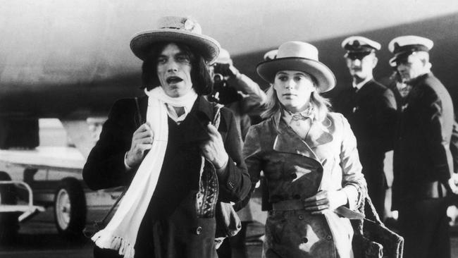 Jagger and Faithful arrive in Sydney in 1969 for the filming of Ned Kelly. Picture: Getty Images