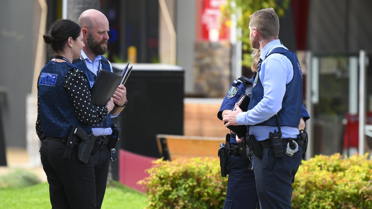 Police and detectives outside Elizabeth City Centre after the stabbing on Wednesday. Picture: Mark Brake