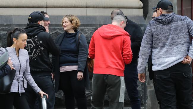 Faruk Orman’s friends and family waiting for him outside the Supreme Court. Picture: Alex Coppel