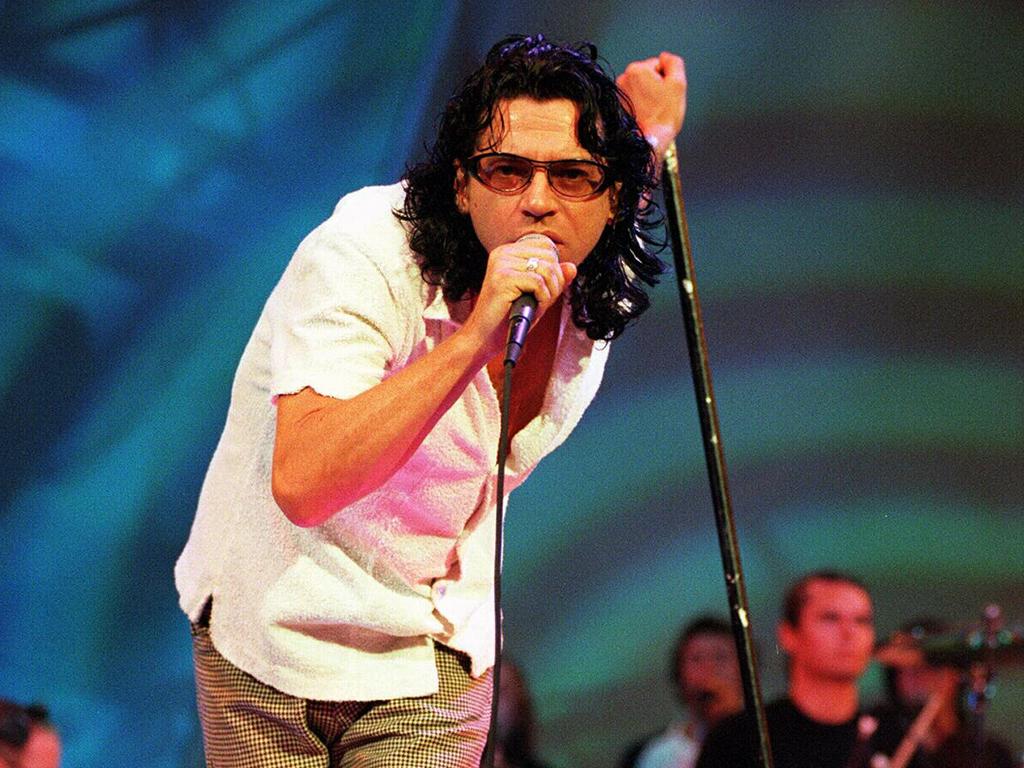 Michael Hutchence rehearses with INXS at Darling Harbour.