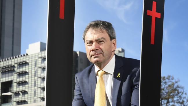 RAA placed hundreds of roadside markers in the heart of Adelaide to represent all the people who lost their lives or were seriously injured in crashes across the state last year. RAA CEO Charles Mountain. (AAP Image/Dean Martin)