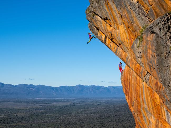 Ashlee Hendy (leading) and Elizabeth Chong (belaying) on pitch two of The Man Who Sold the World (23, 25), Clean Cuts, Grampians, Victoria, Australia.