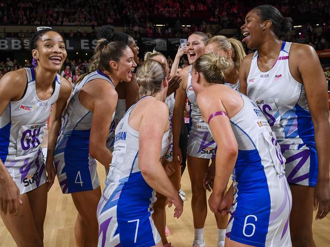 Thunderbirds players celebrate after beating Sunshine Coast Lightning to seal the Super Netball minor premiership. Picture: Getty Images