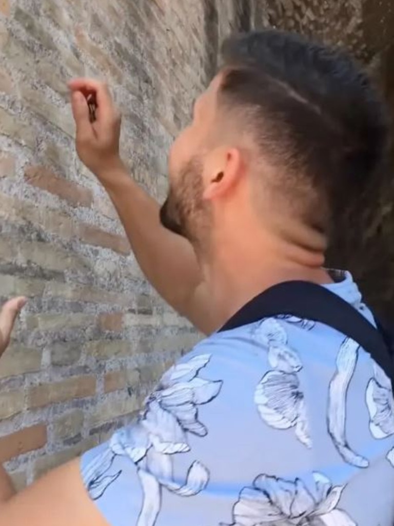 UK tourist Ivan Dimitrov, 27, sent a letter of apology to the mayor of Rome, Italy, after he was caught on video vandalising the Colosseum last month. Picture: YouTube