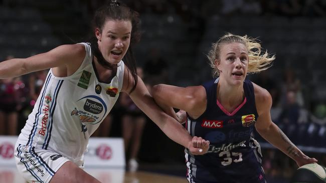 Lara McSpadden, left, on the move in a match against Adelaide last season.