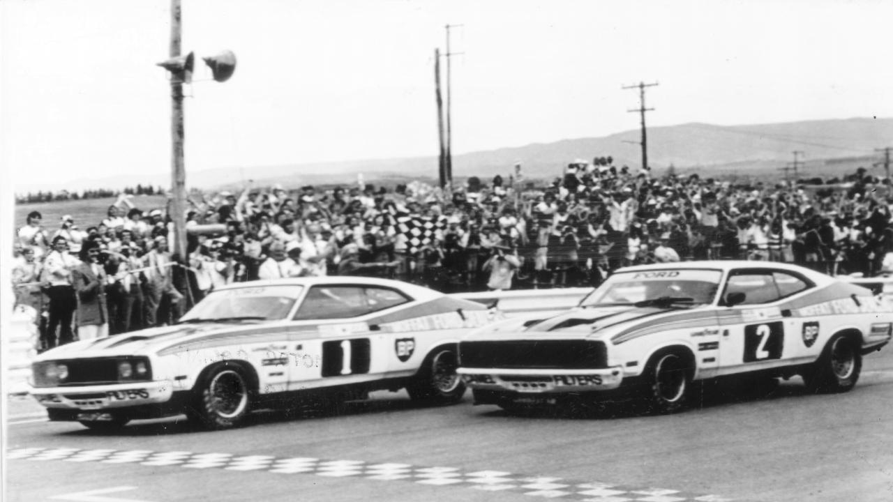 Drivers Allan Moffat (L) and Colin Bond finished 1-2 in their XC Ford Falcons in the 1977 Bathurst 1000 race at Mt Panorama circuit in Bathurst. Picture: Photo File